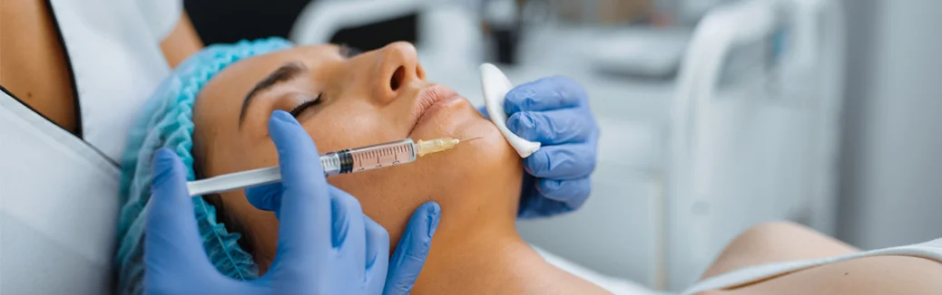 cosmetician-gives-chin-botox-injection-quinnie